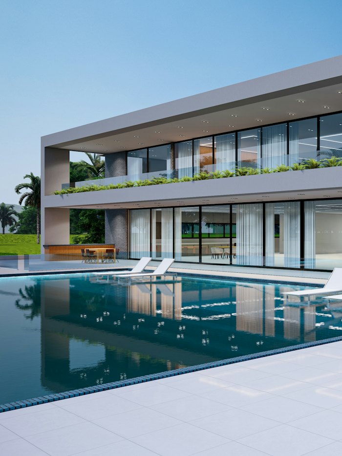Khu nghỉ dưỡng có hồ bơi và ghế tắm nắng
