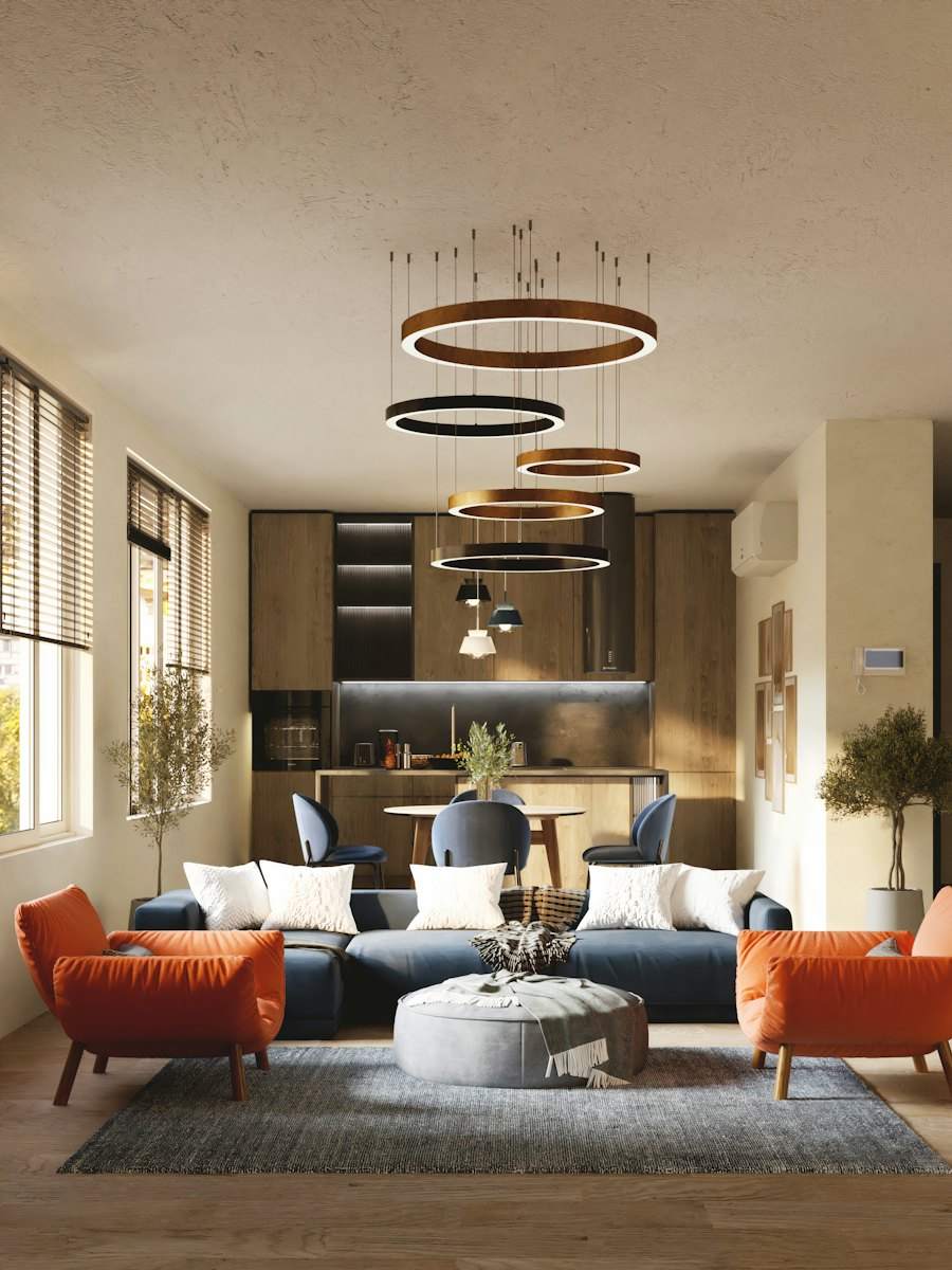 Phòng khách căn hộ với đèn vòng và ghế sofa cam